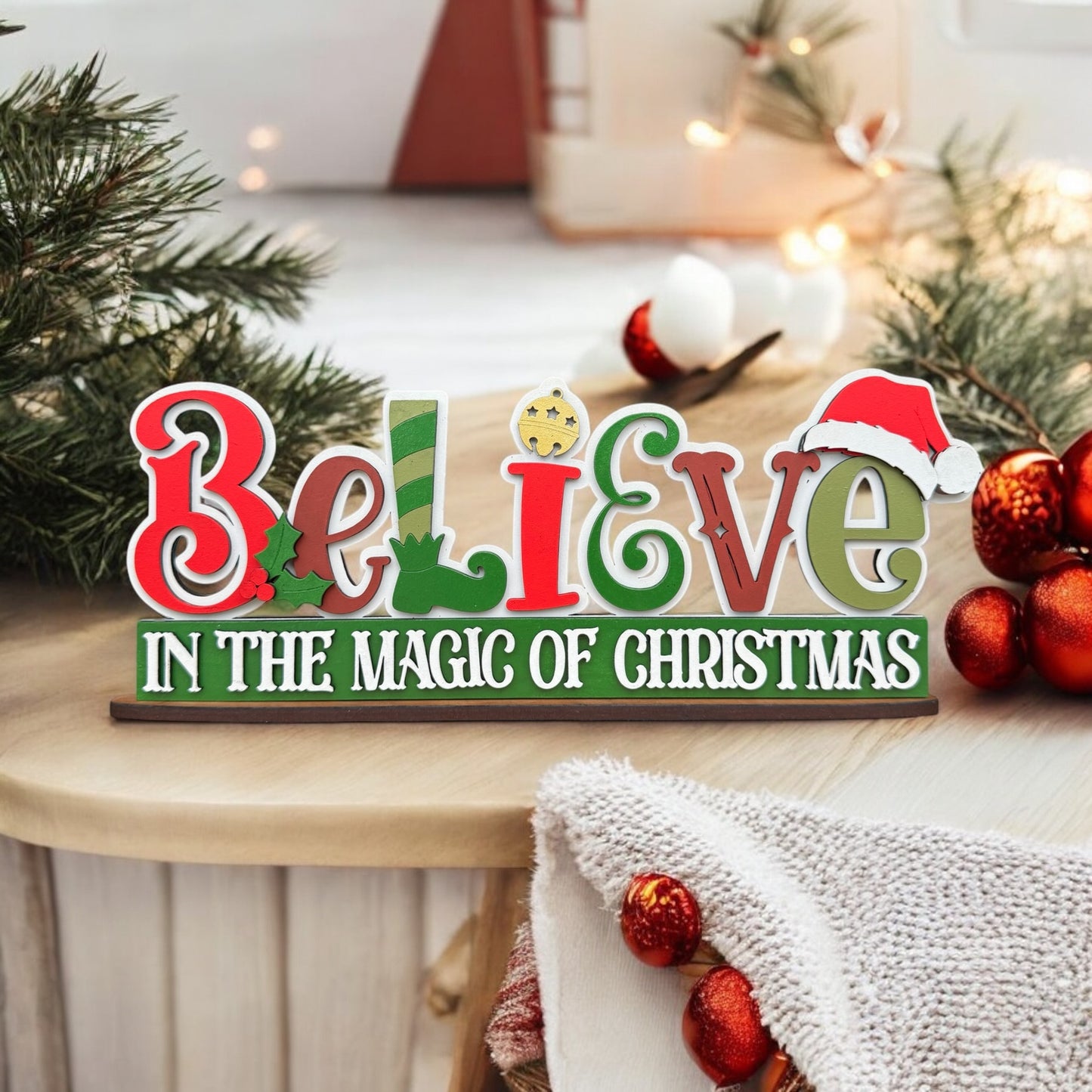 Believe in the magic of Christmas shelf sitter